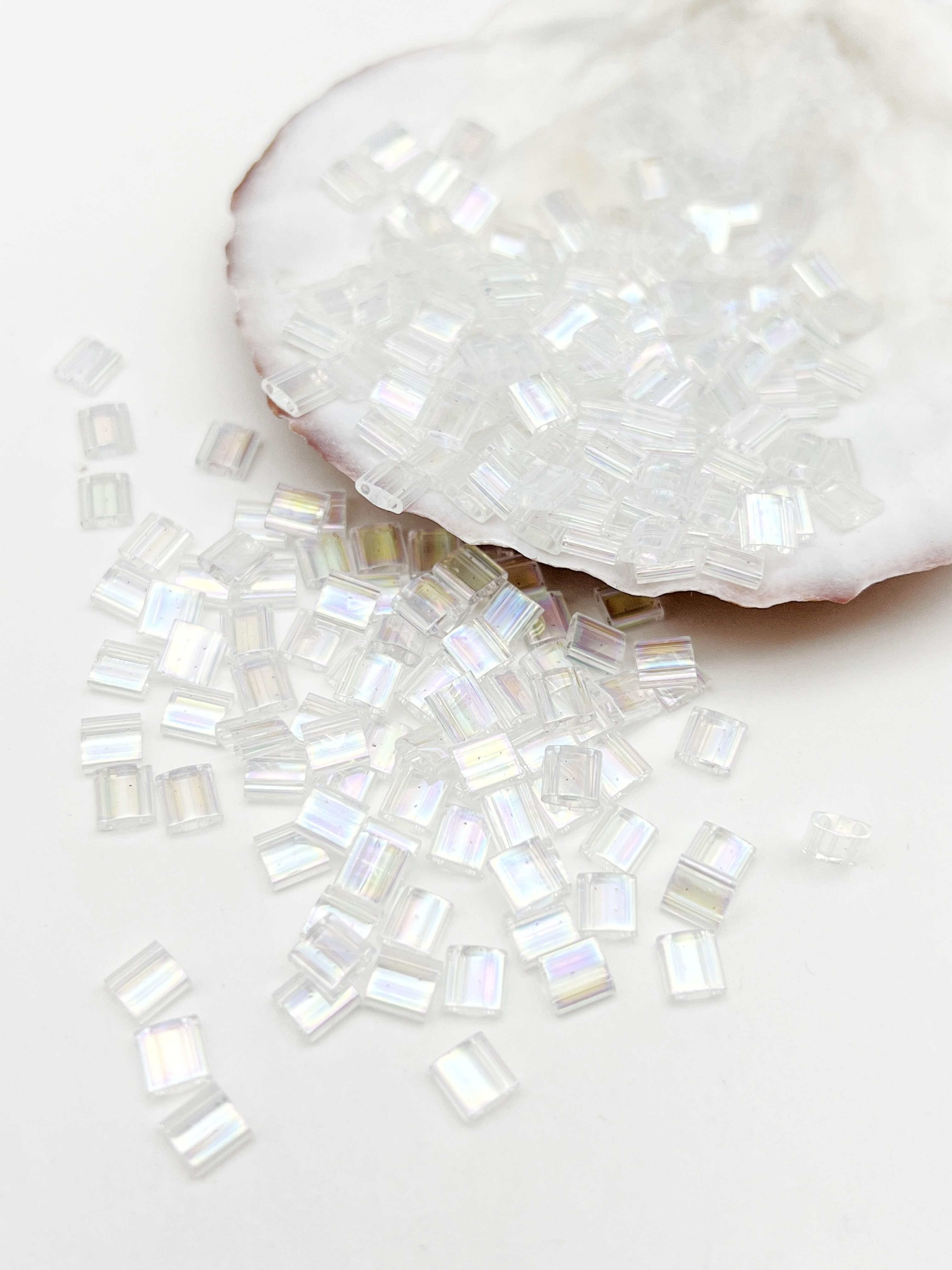 Бисер MIYUKI TILA beads, TL250, 5гр, прозрачный с радужным покрытием. МЮ102